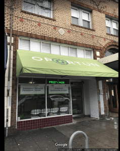 This is an image of an Oportun location in Oakland, California. This is a standalone store.